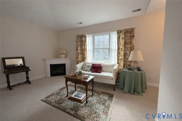 a living room with furniture and a couch