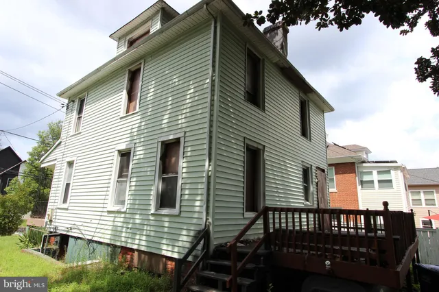 a view of a house with a roof deck