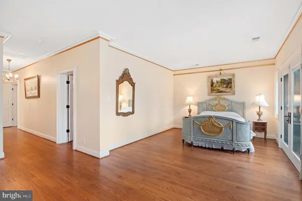 a living room with furniture wooden floor and a rug