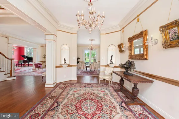 a view of entryway with wooden floor