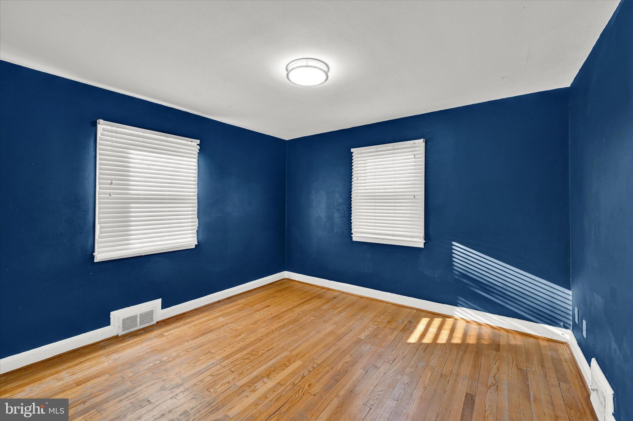 2019 Hillcrest Road Gwynn Oak, MD 21207 - Photo 19 of 29 a view of a room with wooden floor and window