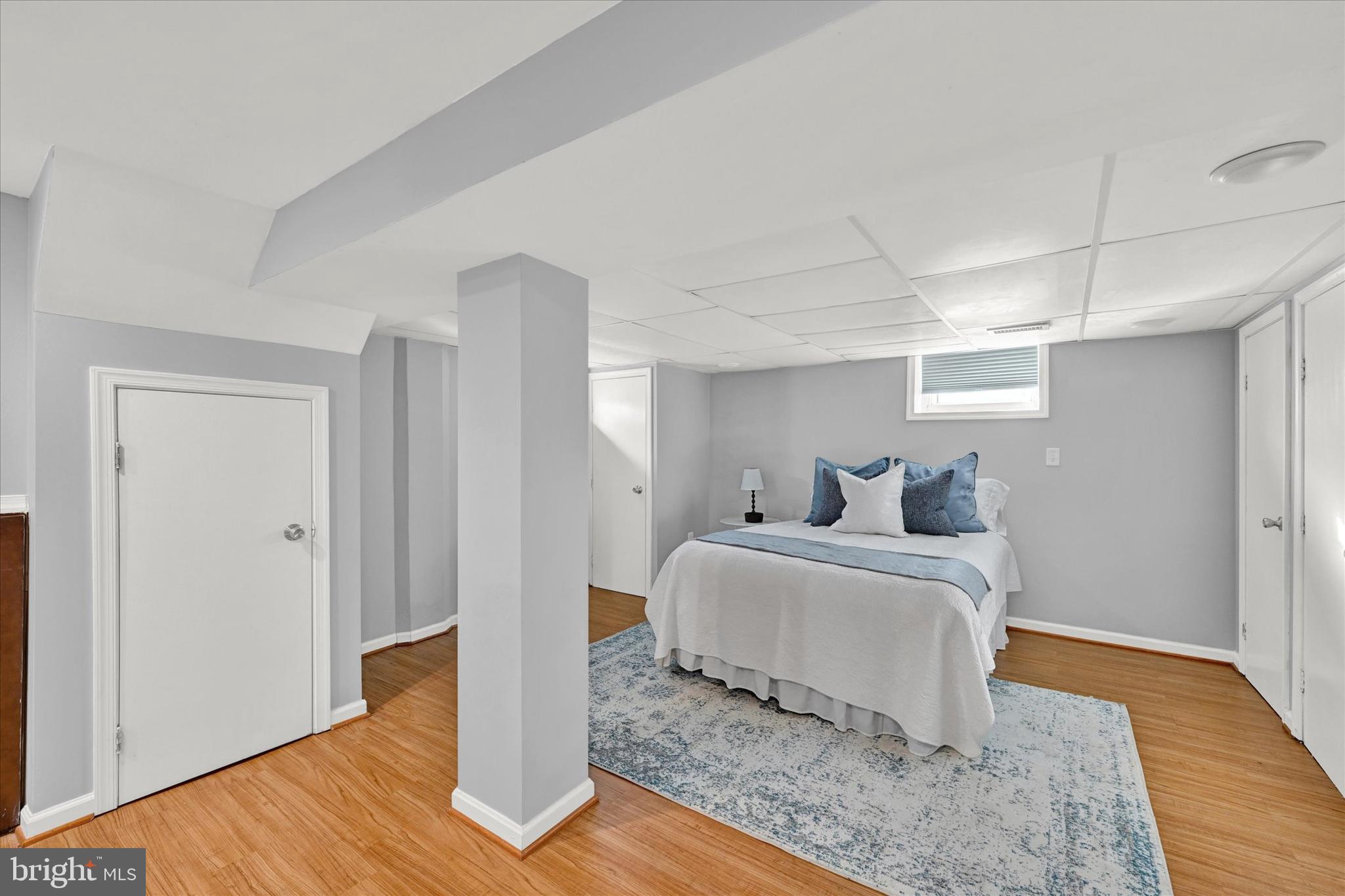 2019 Hillcrest Road Gwynn Oak, MD 21207 - Photo 21 of 29 a bedroom with bed and wooden floor