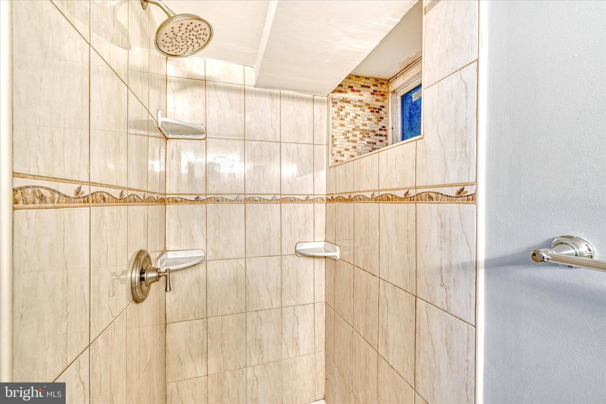 2019 Hillcrest Road Gwynn Oak, MD 21207 - Photo 23 of 29 a bathroom with a shower