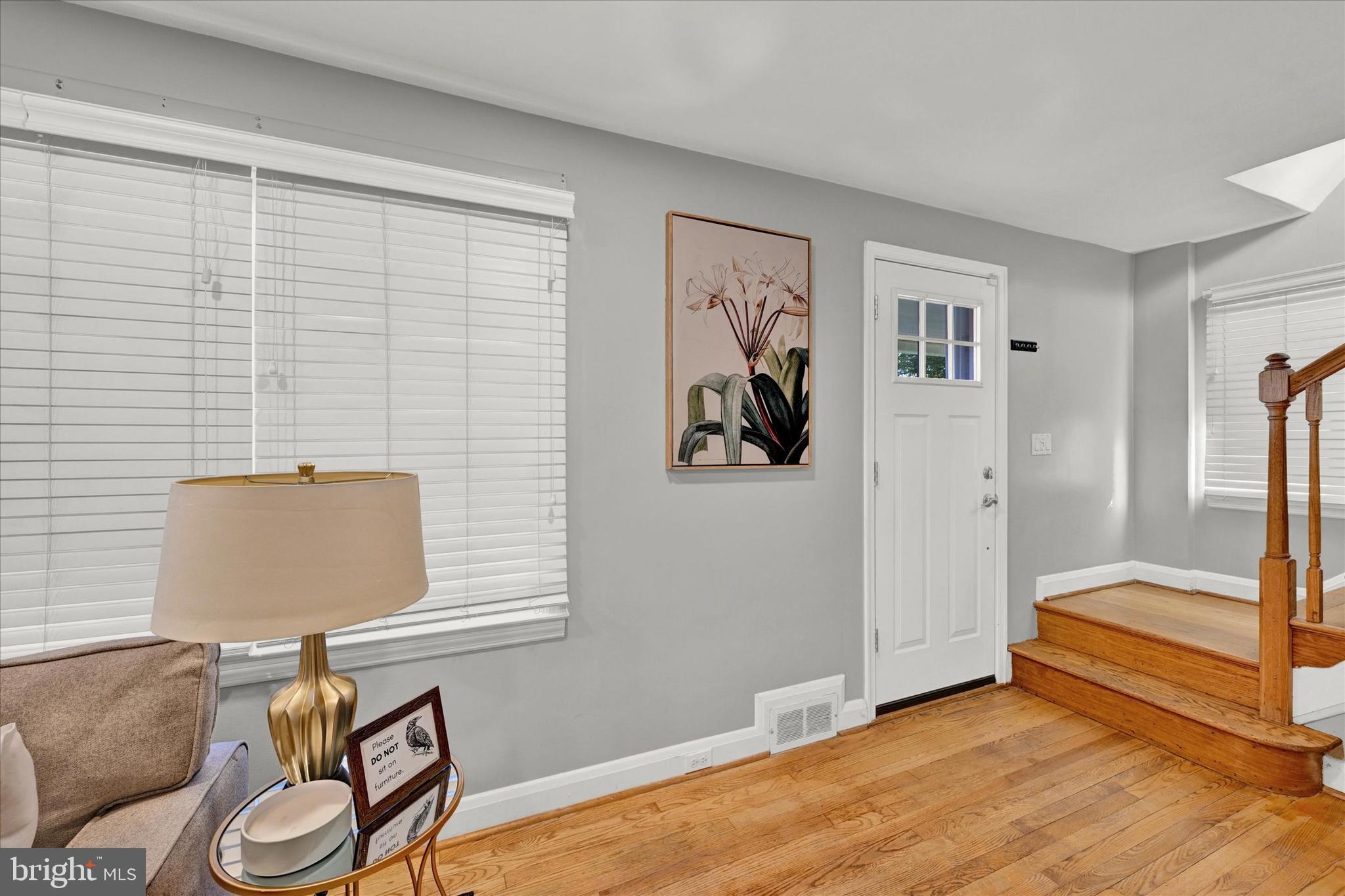 2019 Hillcrest Road Gwynn Oak, MD 21207 - Photo 4 of 29 a living room with furniture and a window