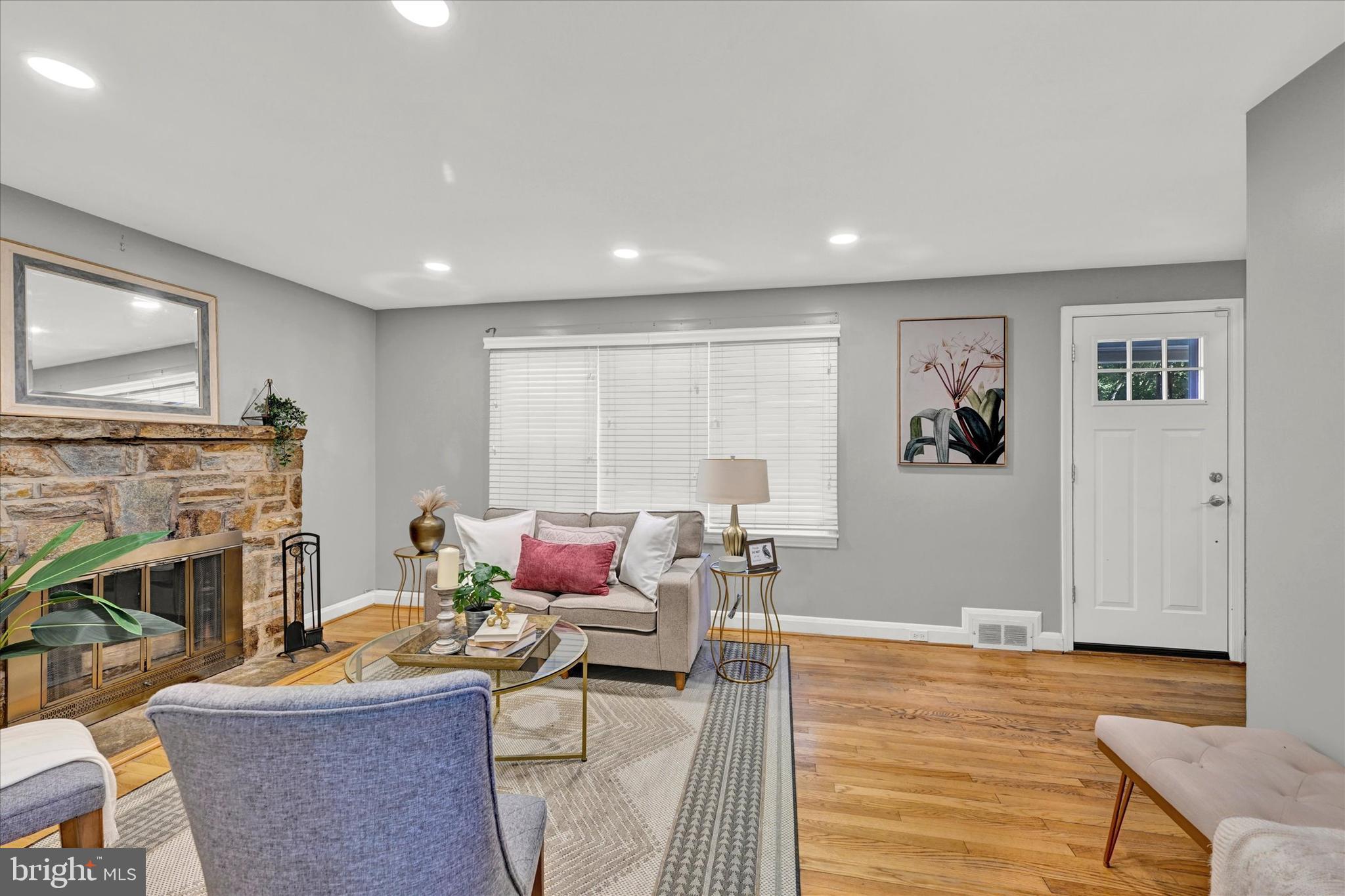 2019 Hillcrest Road Gwynn Oak, MD 21207 - Photo 5 of 29 a living room with furniture and a fireplace