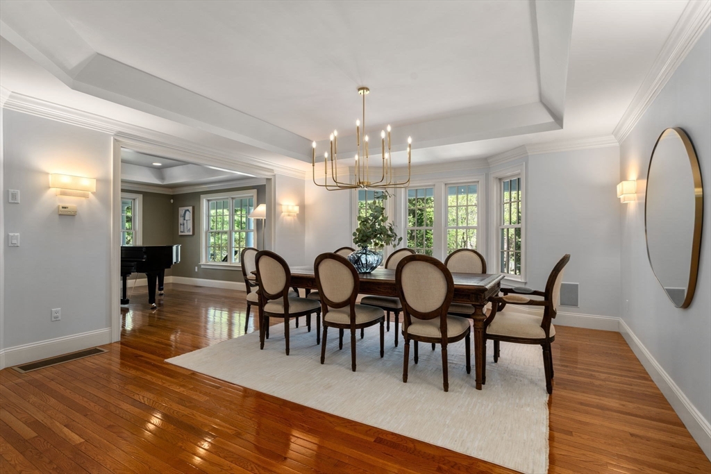 1 Beard Way Wellesley, MA 02482 - Photo 11 of 41 a view of a dining room with furniture window and wooden floor