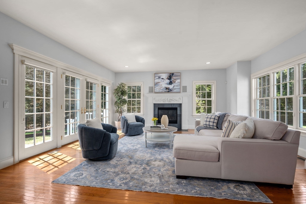 1 Beard Way Wellesley, MA 02482 - Photo 15 of 41 a living room with furniture and a fireplace