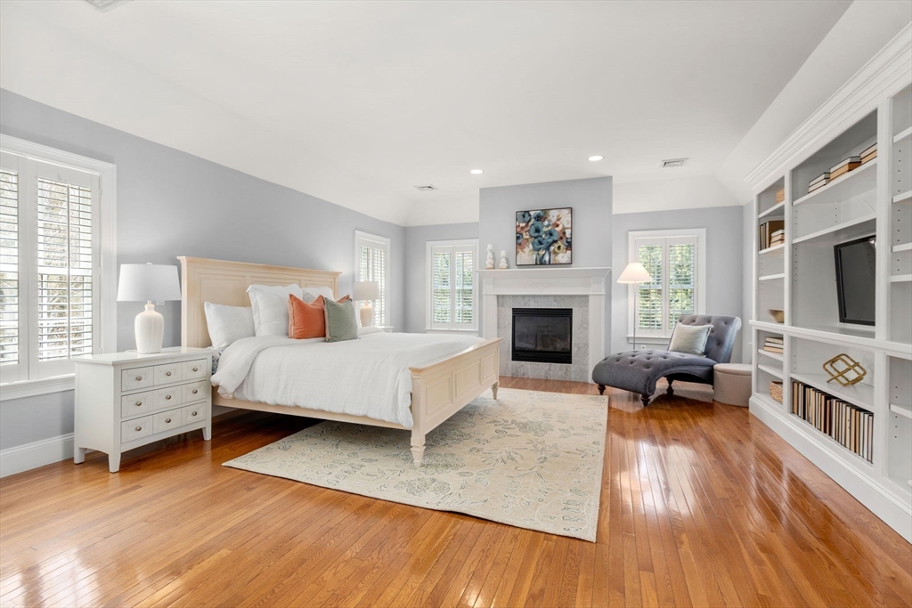 1 Beard Way Wellesley, MA 02482 - Photo 21 of 41 a bedroom with a bed and a flat tv screen