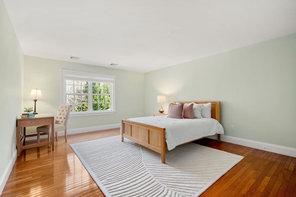 1 Beard Way Wellesley, MA 02482 - Photo 29 of 41 a room with a bed and a table