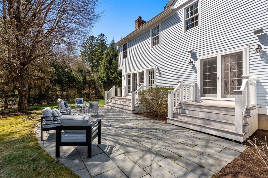 1 Beard Way Wellesley, MA 02482 - Photo 37 of 41 a view of a house with backyard and sitting area