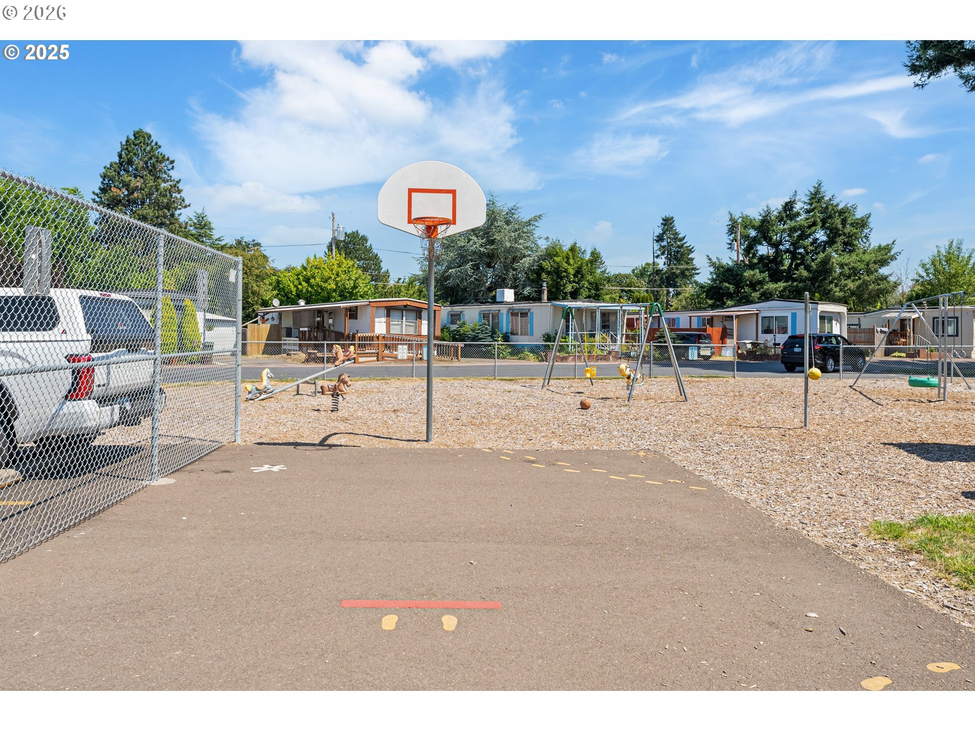 8951 Southeast Fuller Road, Unit 7 Happy Valley, OR 97086 - Photo 19 of 24 a view of a basketball court