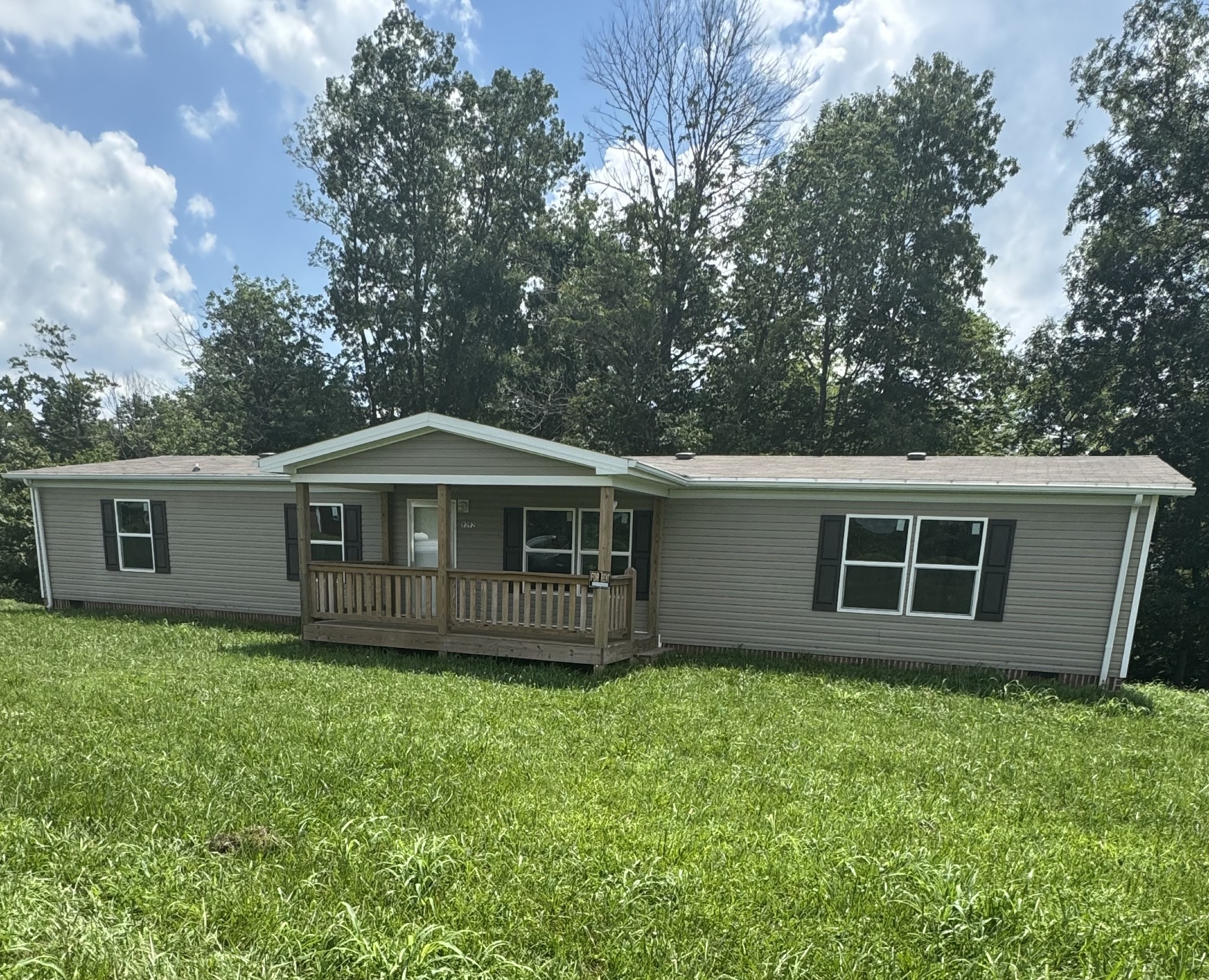 9392 Sunrise Road Red Boiling Springs, TN 37150 - Photo 1 of 12 a view of a house with a yard