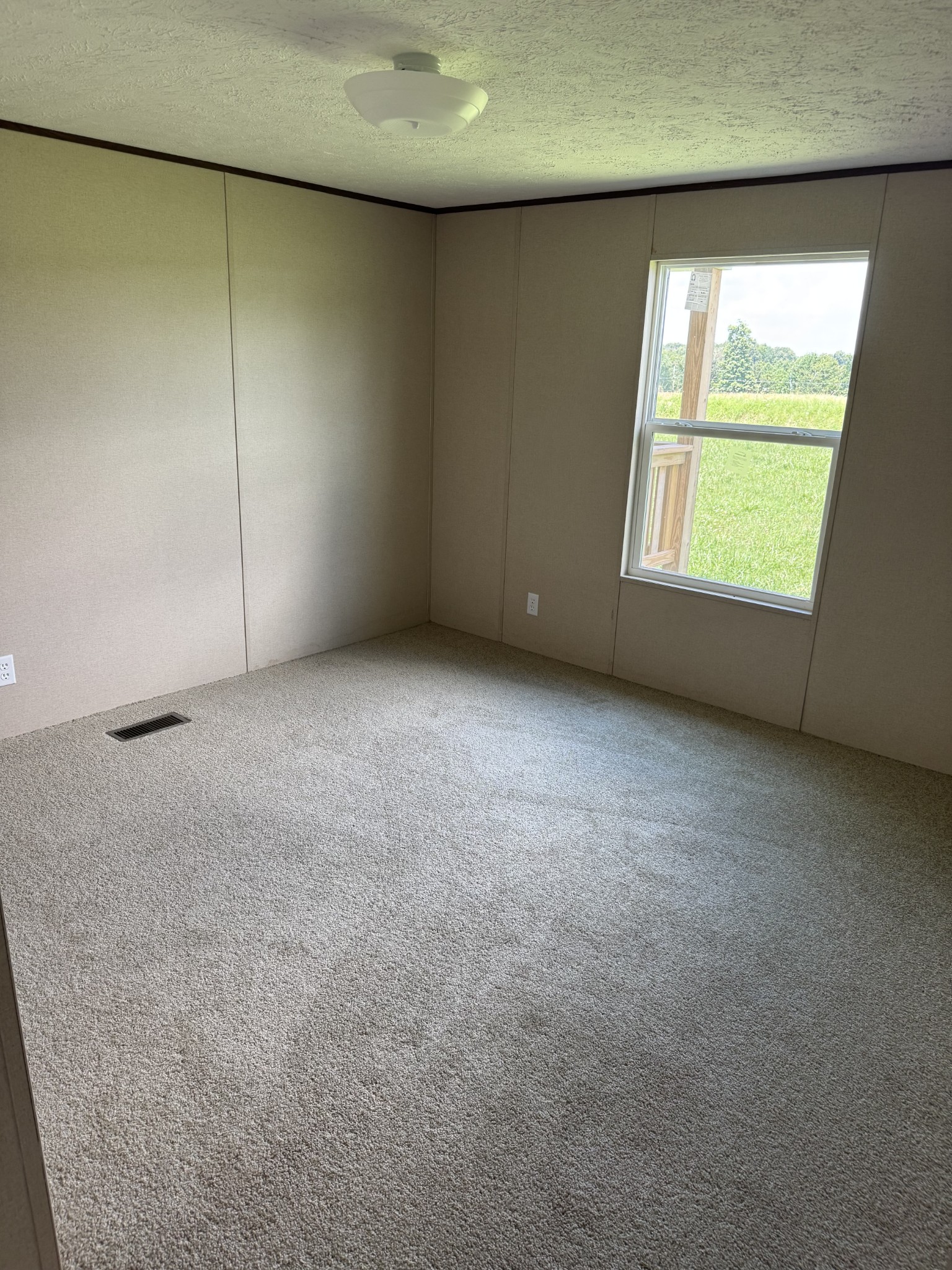 9392 Sunrise Road Red Boiling Springs, TN 37150 - Photo 12 of 12 an empty room with windows