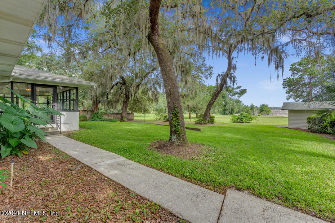 6302 Baker Road Keystone Heights, FL 32656 - Photo 31 of 40 Side entrance to Florida room