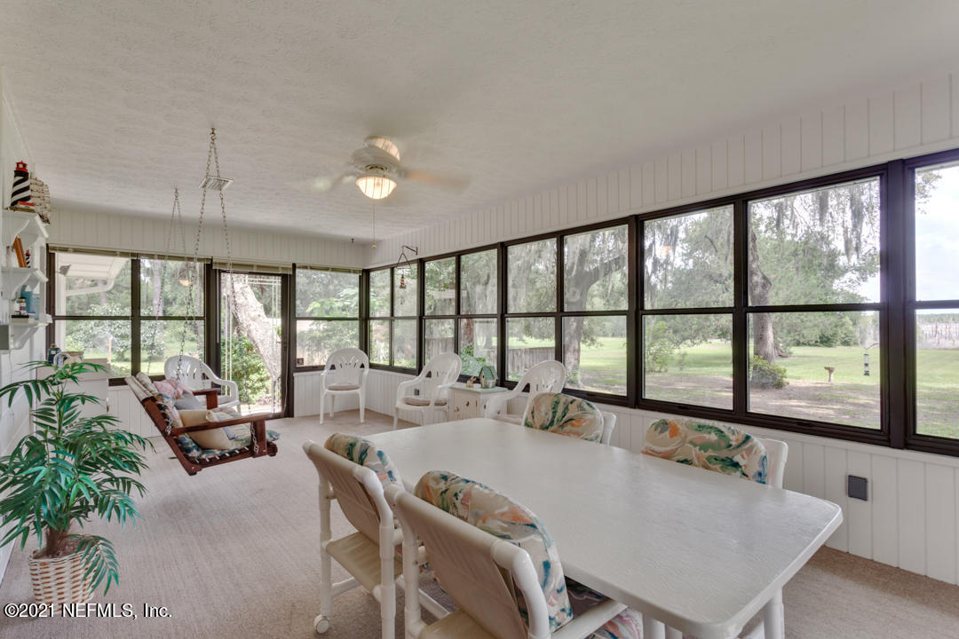 6302 Baker Road Keystone Heights, FL 32656 - Photo 7 of 40 Florida room overlooks Lake Geneva