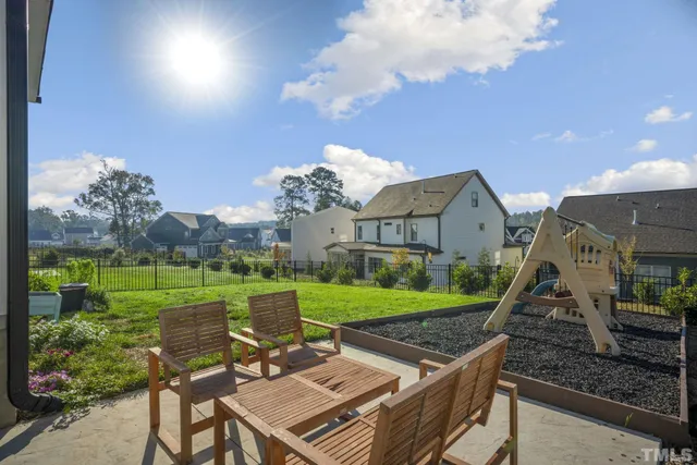 a view of a patio in backyard