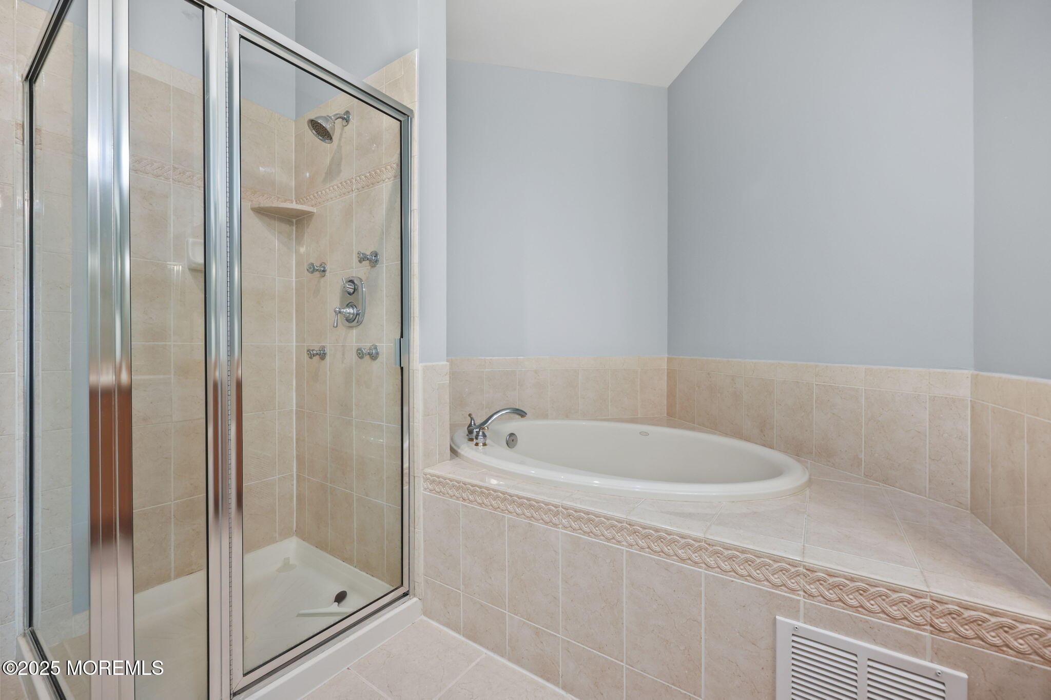 3208 Falston Circle, Unit 3208 Old Bridge, NJ 08857 - Photo 20 of 39 a bathroom with a bathtub and a shower