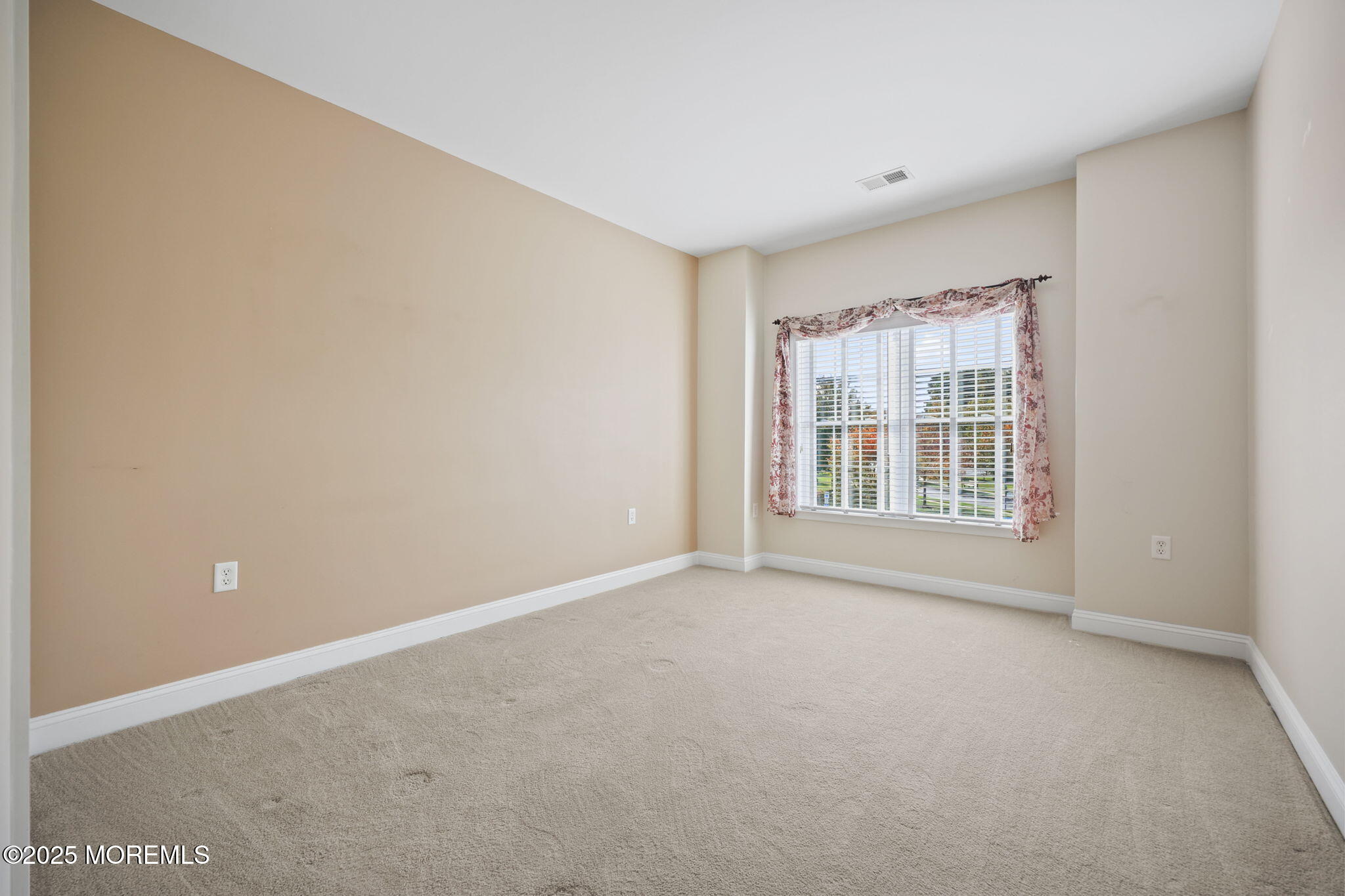 3208 Falston Circle, Unit 3208 Old Bridge, NJ 08857 - Photo 21 of 39 a view of an empty room with a window
