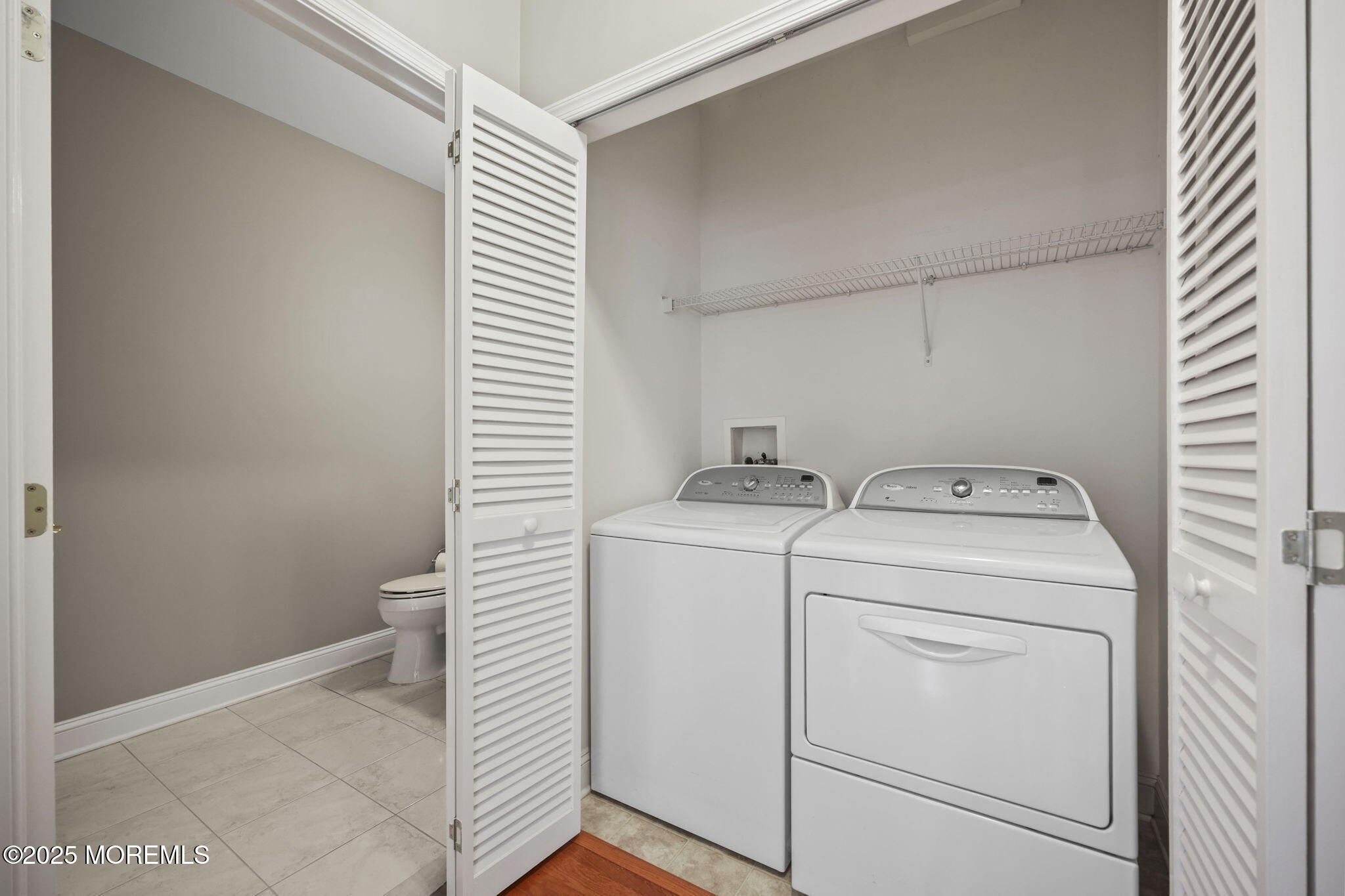 3208 Falston Circle, Unit 3208 Old Bridge, NJ 08857 - Photo 23 of 39 a utility room with dryer and washer