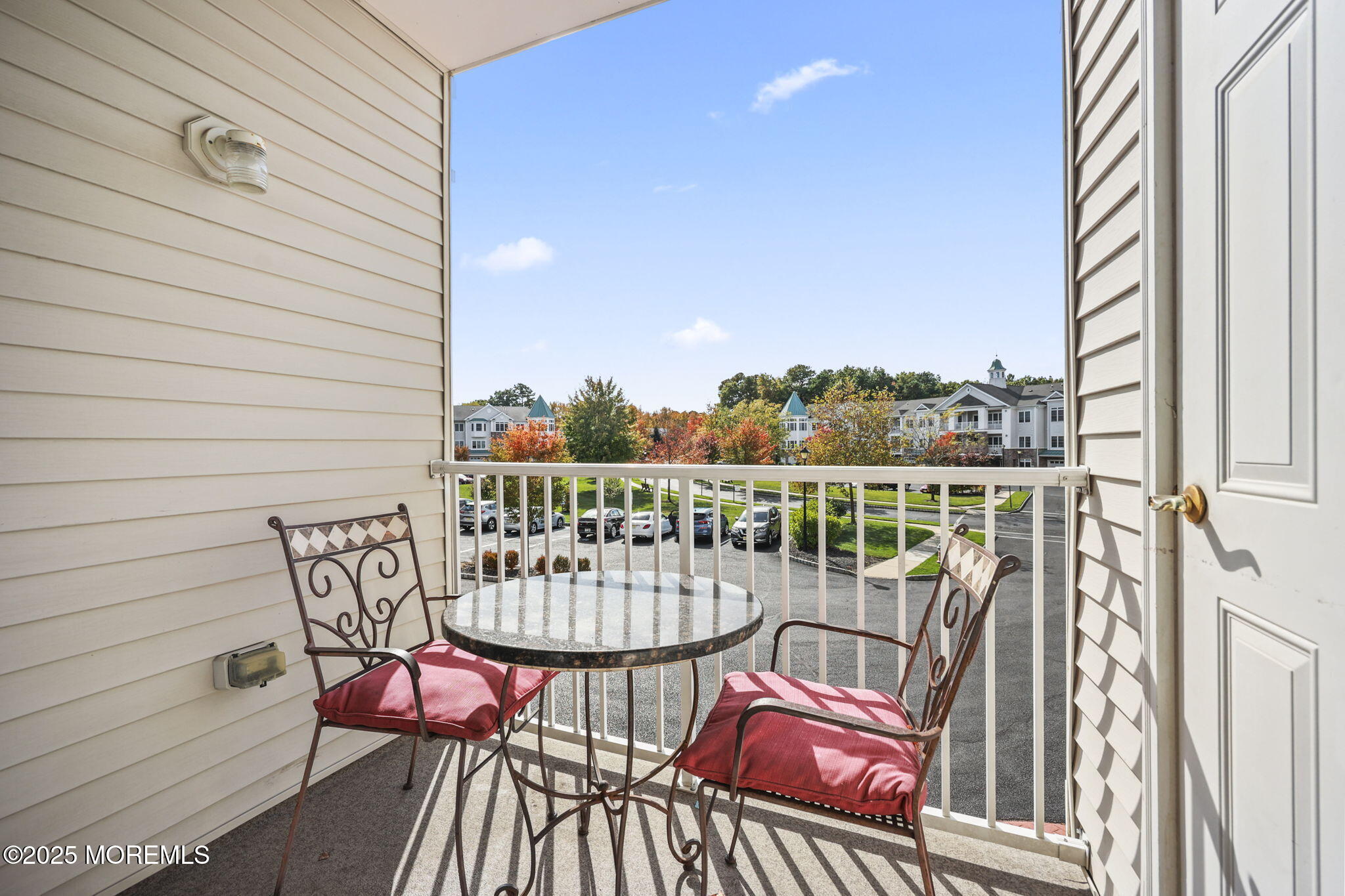 3208 Falston Circle, Unit 3208 Old Bridge, NJ 08857 - Photo 26 of 39 a view of a chairs in a balcony