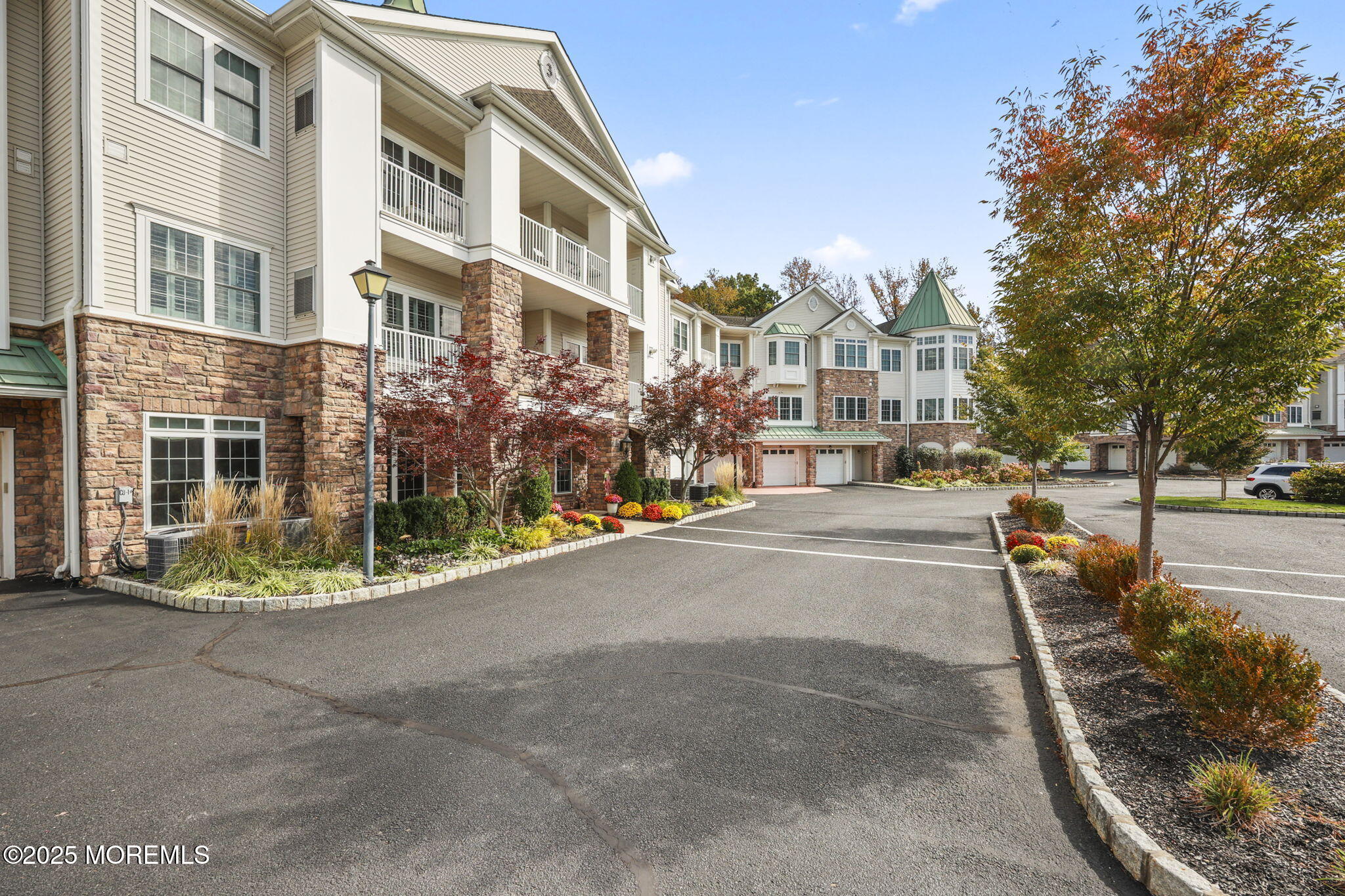 3208 Falston Circle, Unit 3208 Old Bridge, NJ 08857 - Photo 29 of 39 a view of a street with a building in the background