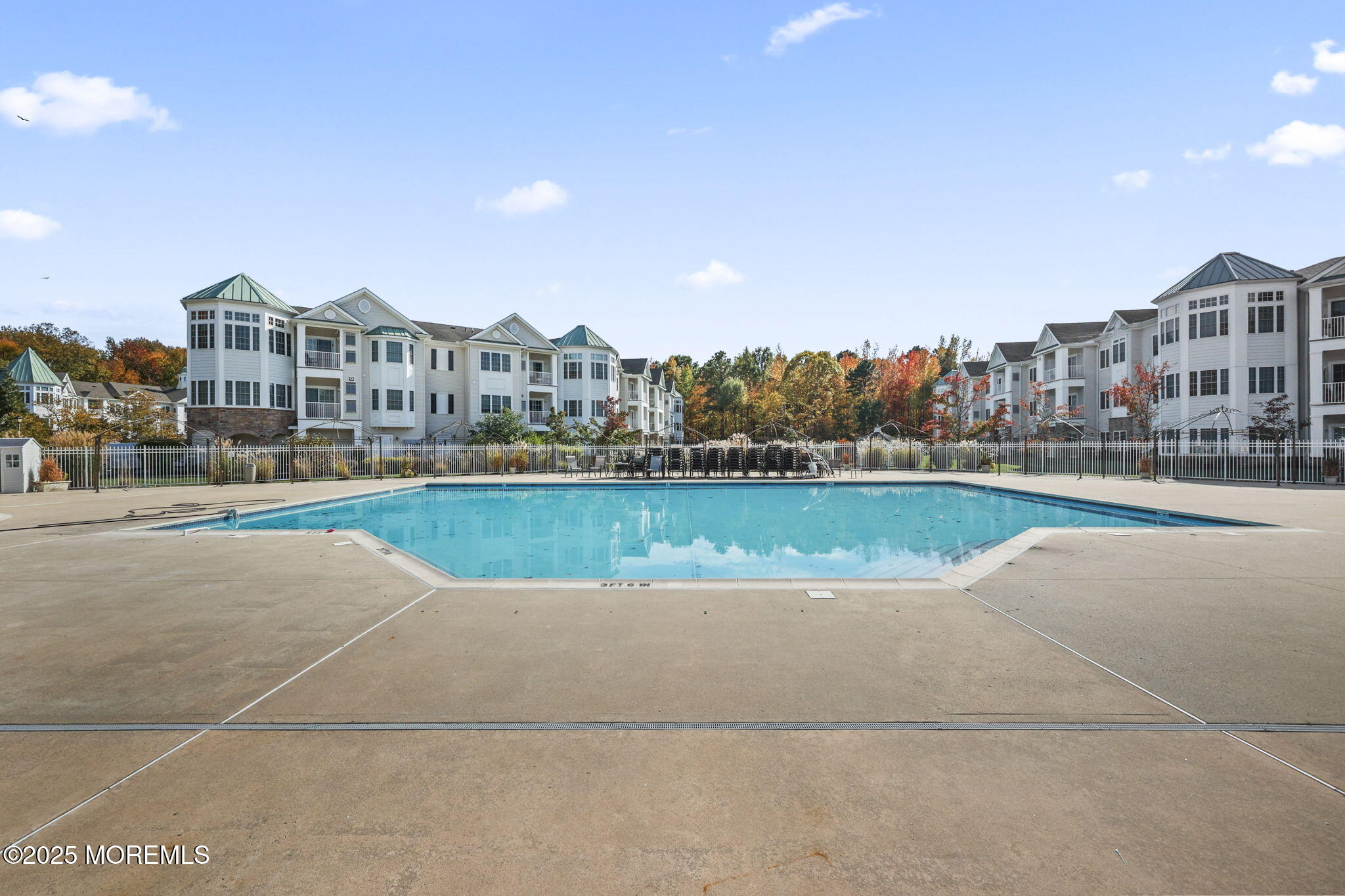 3208 Falston Circle, Unit 3208 Old Bridge, NJ 08857 - Photo 37 of 39 a view of swimming pool and a yard in front of the house