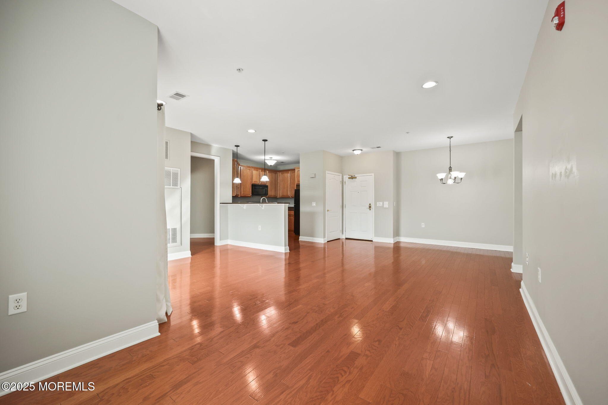 3208 Falston Circle, Unit 3208 Old Bridge, NJ 08857 - Photo 7 of 39 a view of a kitchen with a sink and a refrigerator