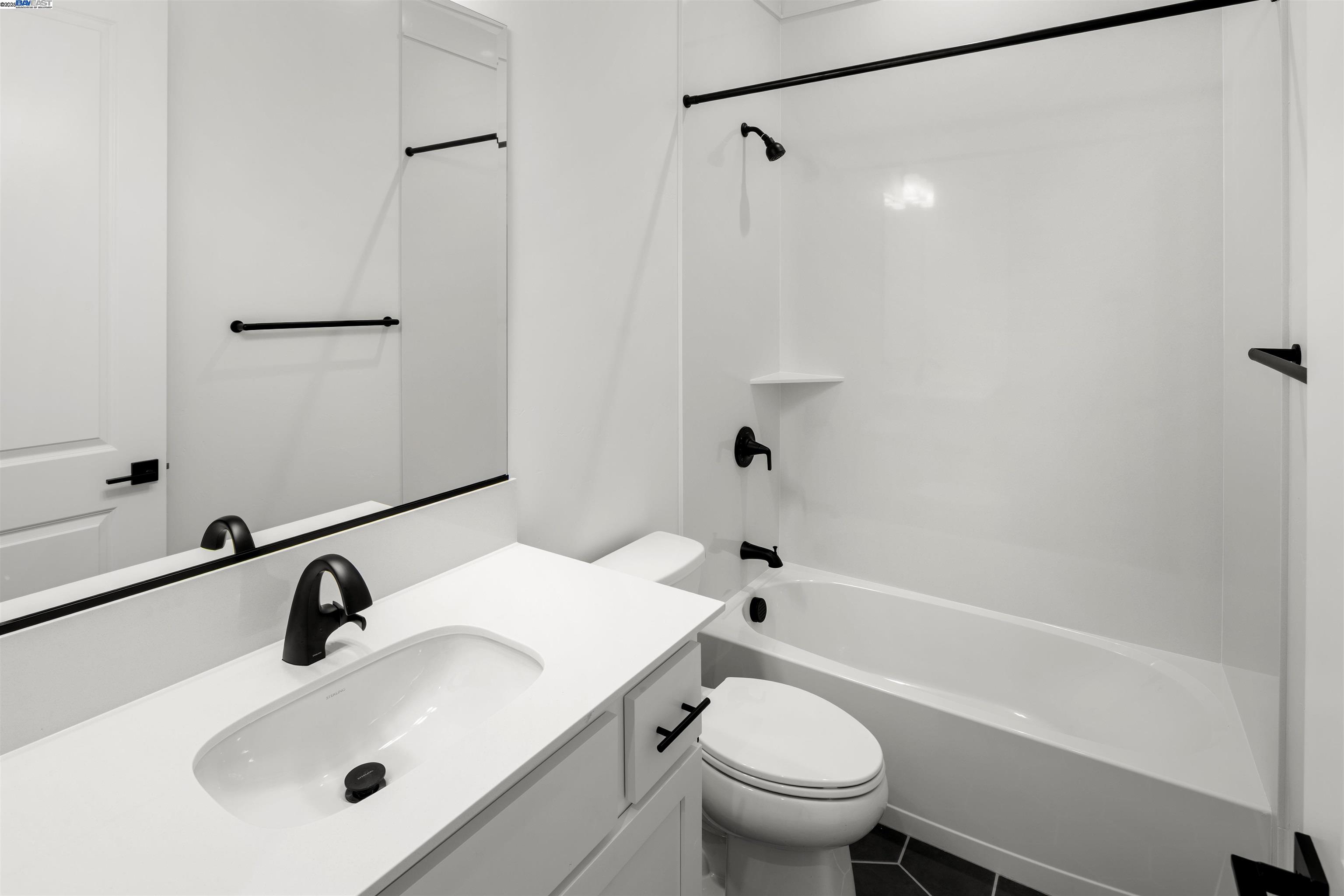 6012 Windsweep Road Bethel Island, CA 94511 - Photo 17 of 33 a bathroom with a sink toilet and shower