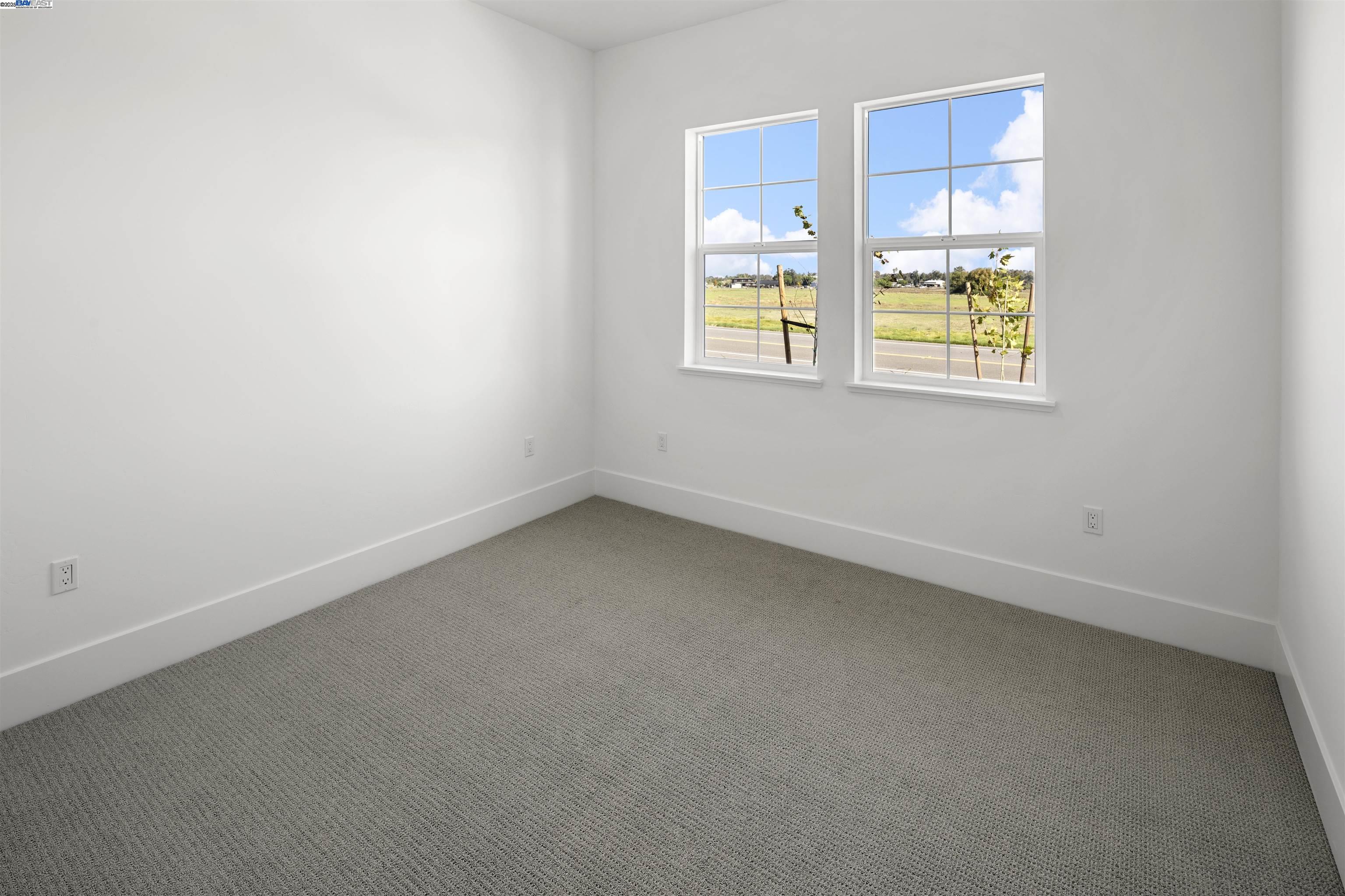 6012 Windsweep Road Bethel Island, CA 94511 - Photo 20 of 33 an empty room with windows