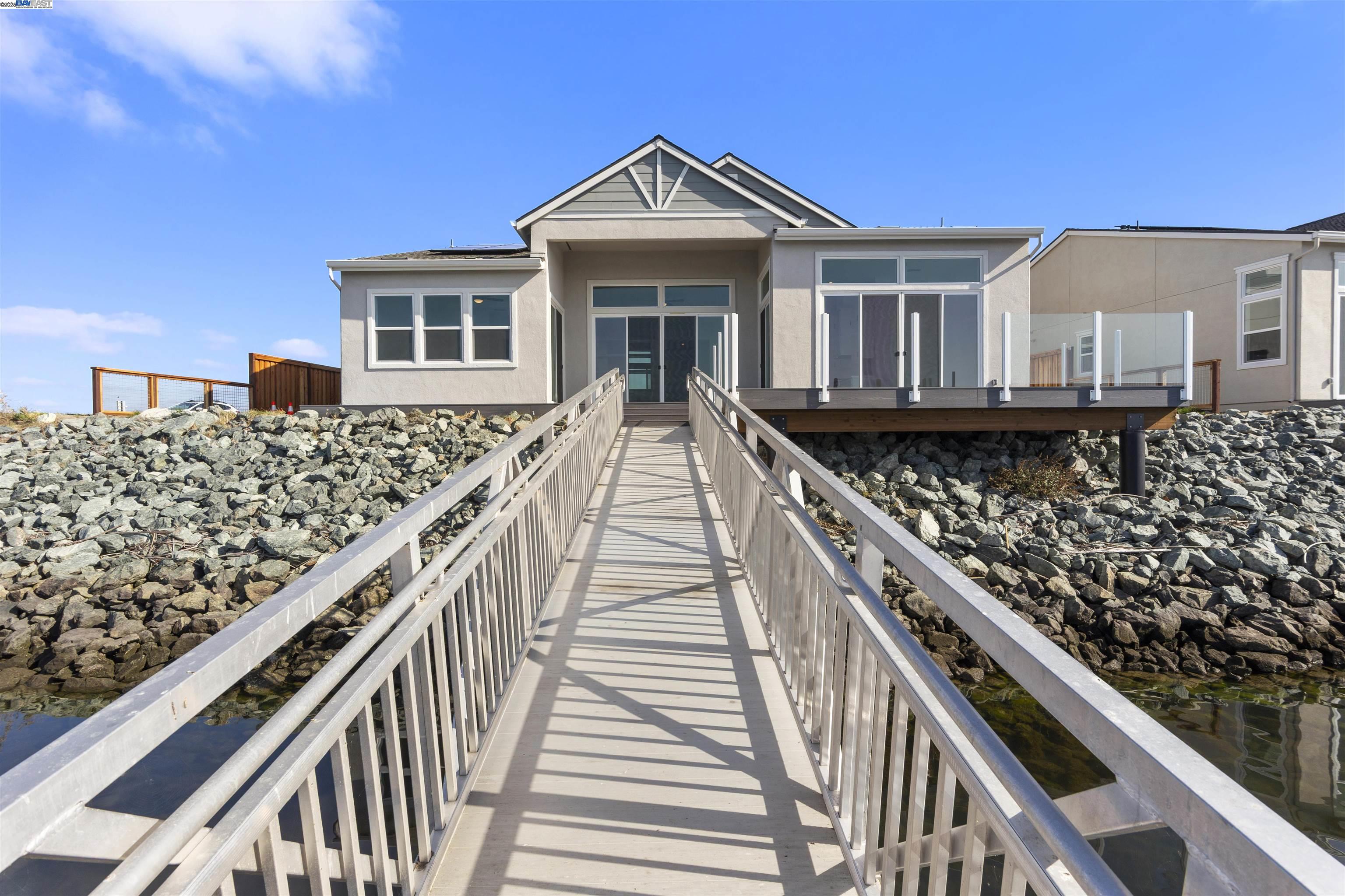 6012 Windsweep Road Bethel Island, CA 94511 - Photo 30 of 33 a front view of a house with wooden stairs