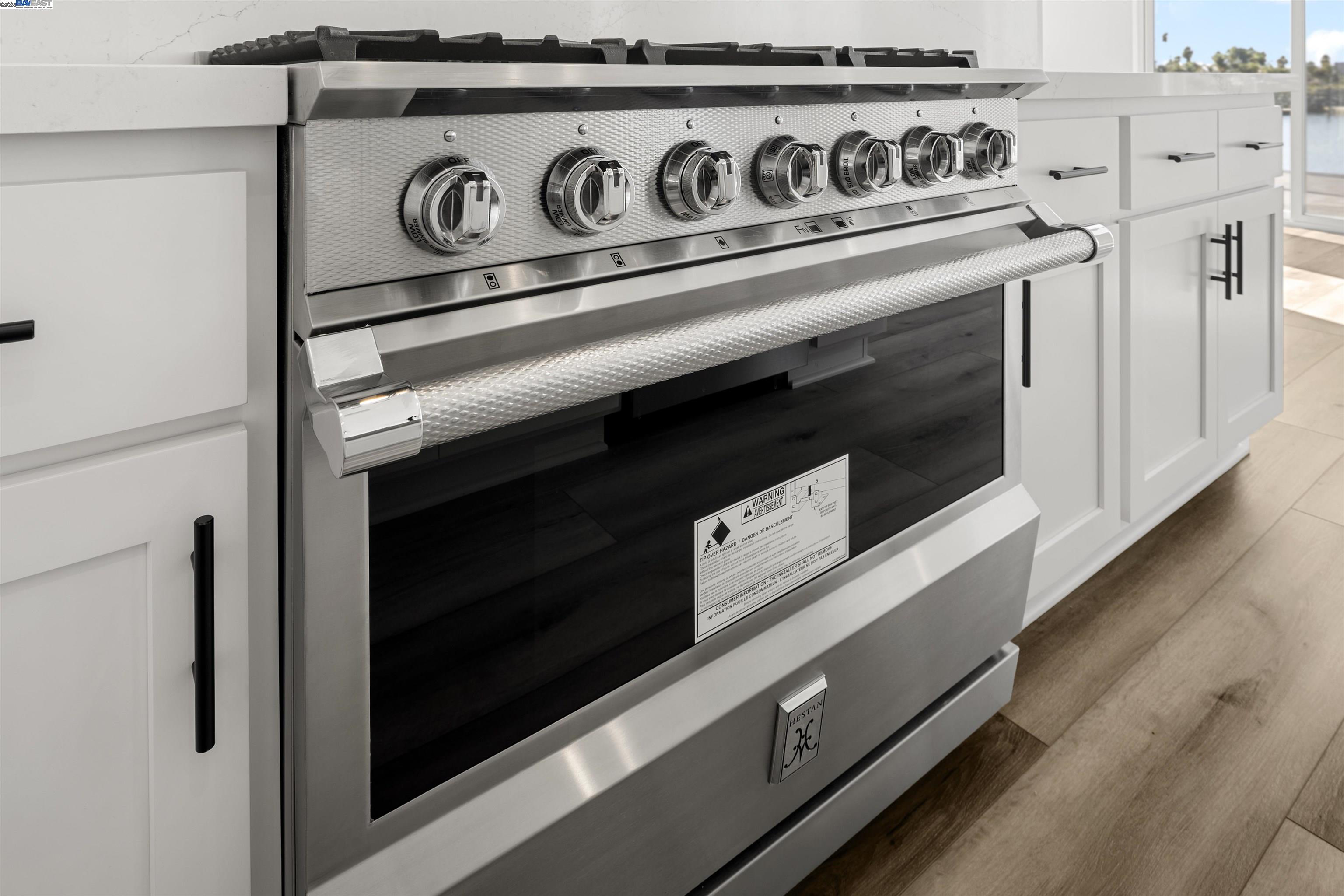 6012 Windsweep Road Bethel Island, CA 94511 - Photo 9 of 33 a close view of a stove with kitchen island