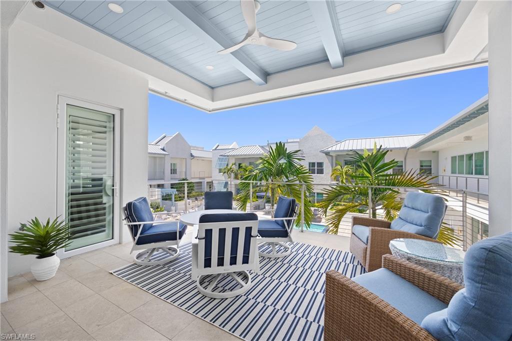 201 8th Street South, Unit 310 Naples, FL 34102 - Photo 23 of 40 a outdoor living space with furniture