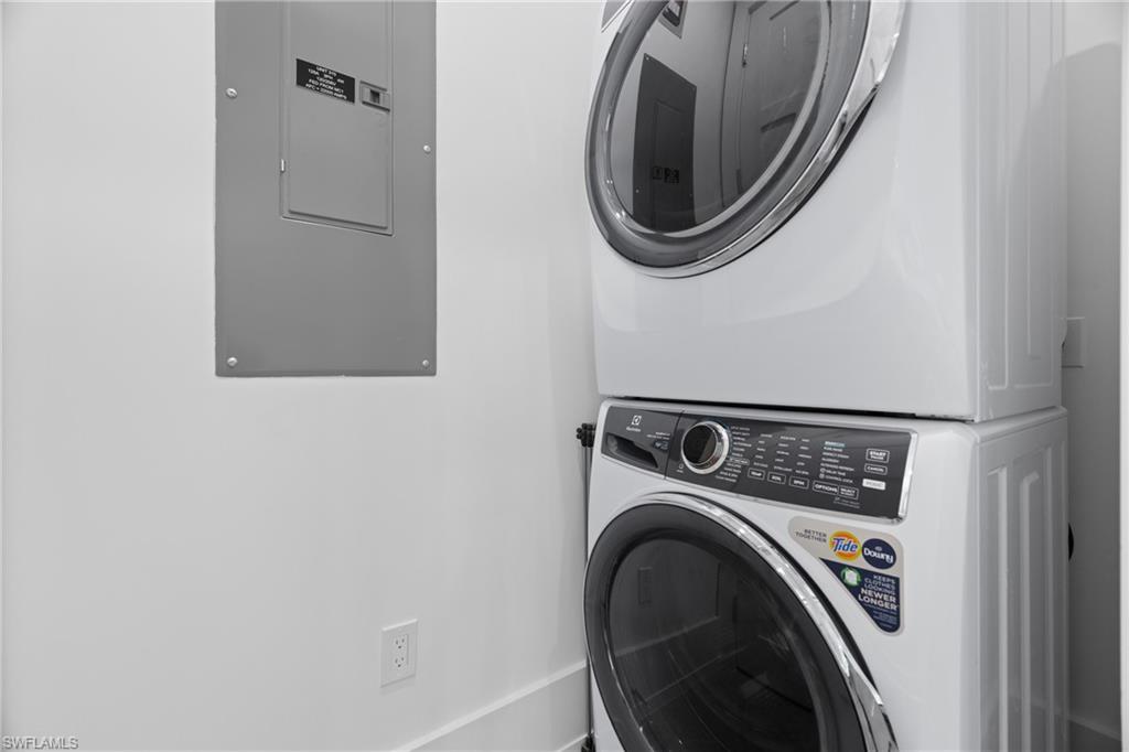 201 8th Street South, Unit 310 Naples, FL 34102 - Photo 25 of 40 a utility room with dryer and washer