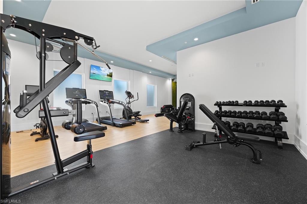 201 8th Street South, Unit 310 Naples, FL 34102 - Photo 36 of 40 a view of a room with gym equipment