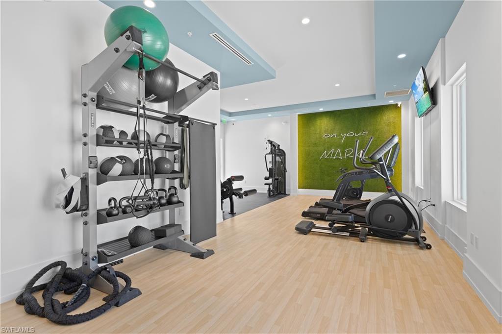 201 8th Street South, Unit 310 Naples, FL 34102 - Photo 37 of 40 a view of a room with gym equipment