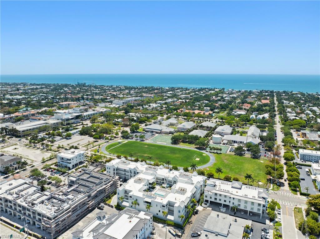 201 8th Street South, Unit 310 Naples, FL 34102 - Photo 40 of 40 an aerial view of a house with a outdoor space
