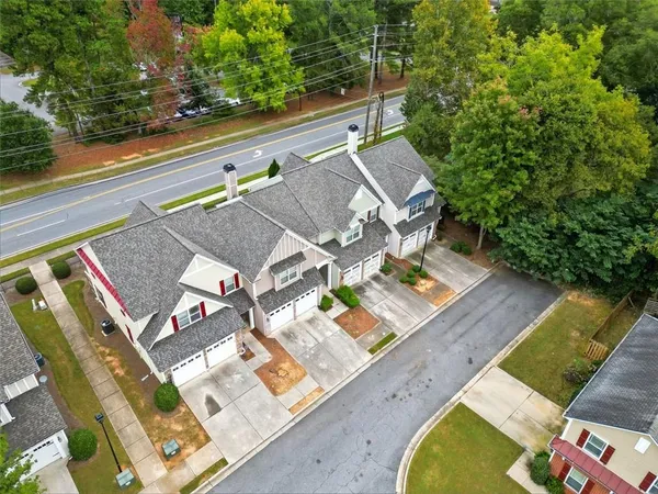 an aerial view of residential house with pool