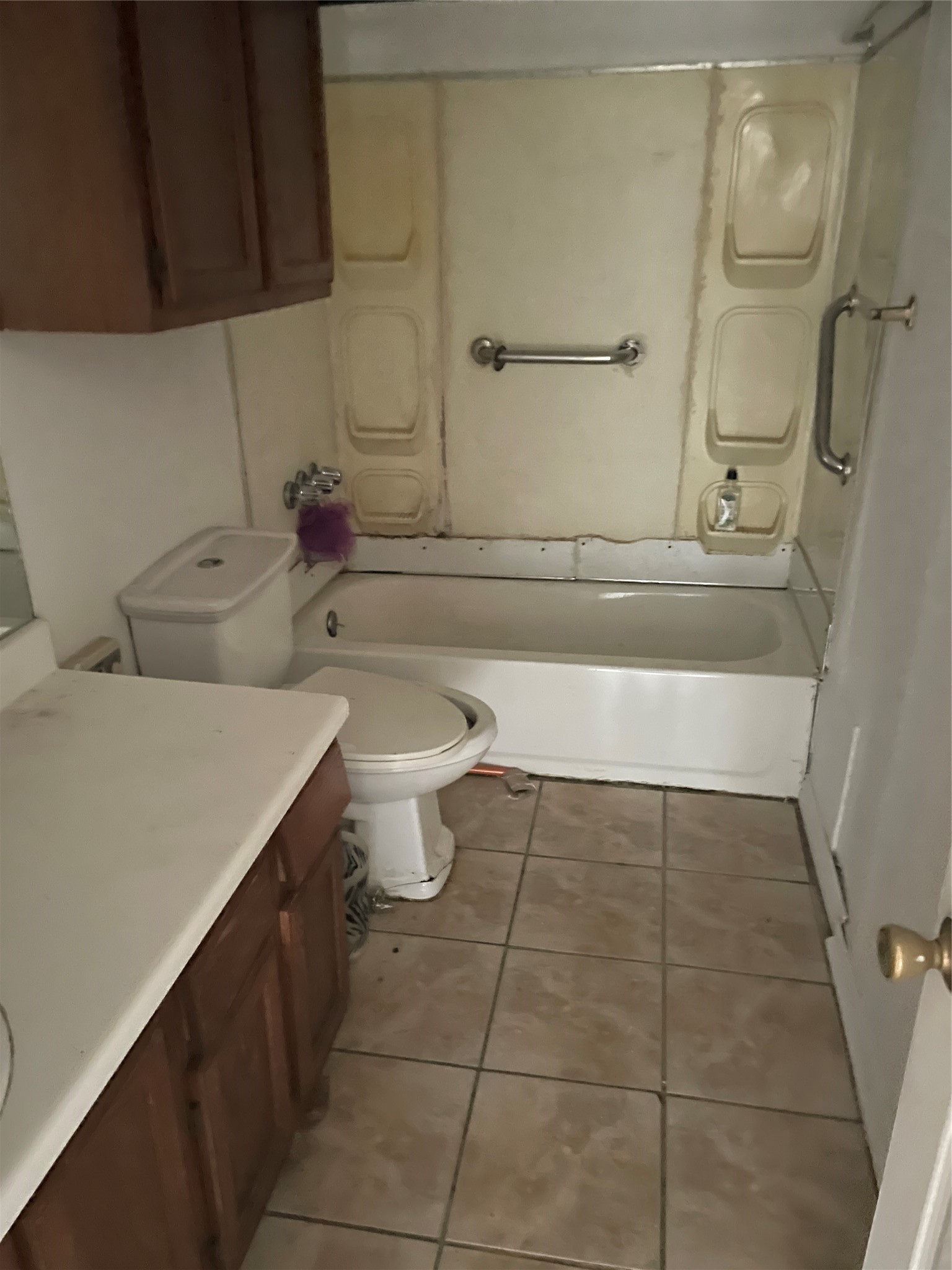 2308 Russell Street Houston, TX 77026 - Photo 5 of 10 a bathroom with a toilet a sink and bathtub