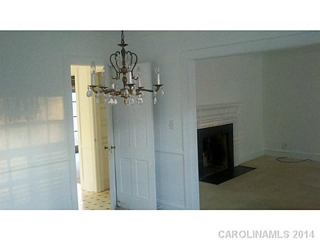 2919 Sharon Road Charlotte, NC 28211 - Photo 11 of 12 a bathroom with a sink and a mirror