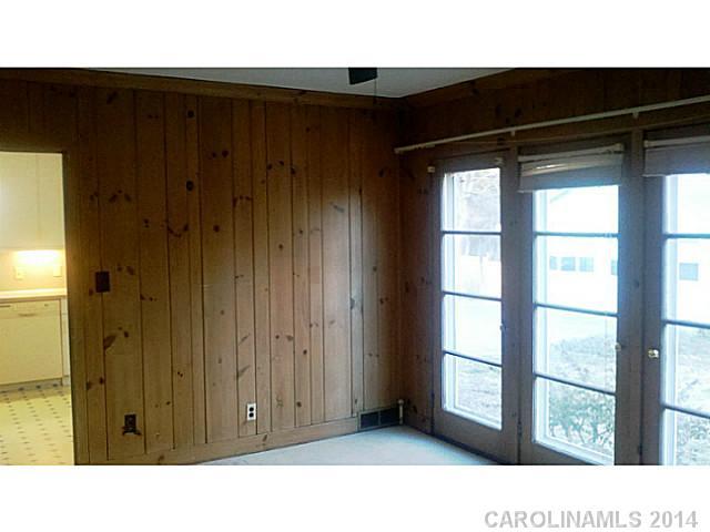 2919 Sharon Road Charlotte, NC 28211 - Photo 7 of 12 a black and white wall of a window