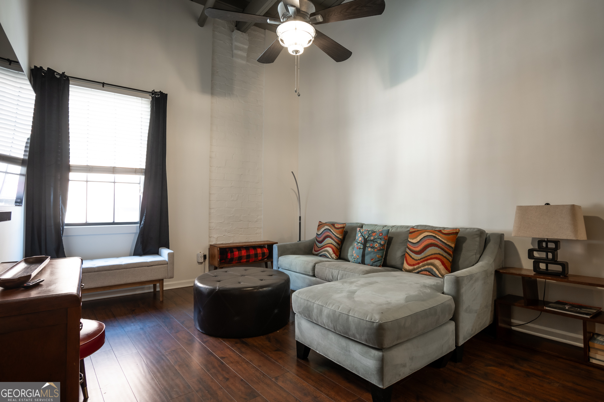 269 North Hull Street, Unit 202 Athens, GA 30601 - Photo 11 of 25 a living room with furniture and a large window