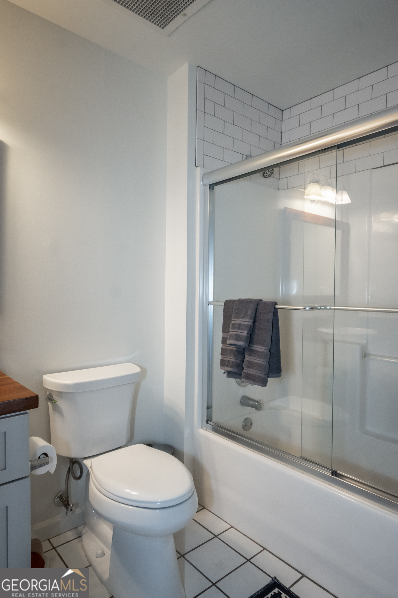 269 North Hull Street, Unit 202 Athens, GA 30601 - Photo 24 of 25 a bathroom with a shower and a toilet