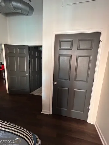 a view of entryway with wooden floor