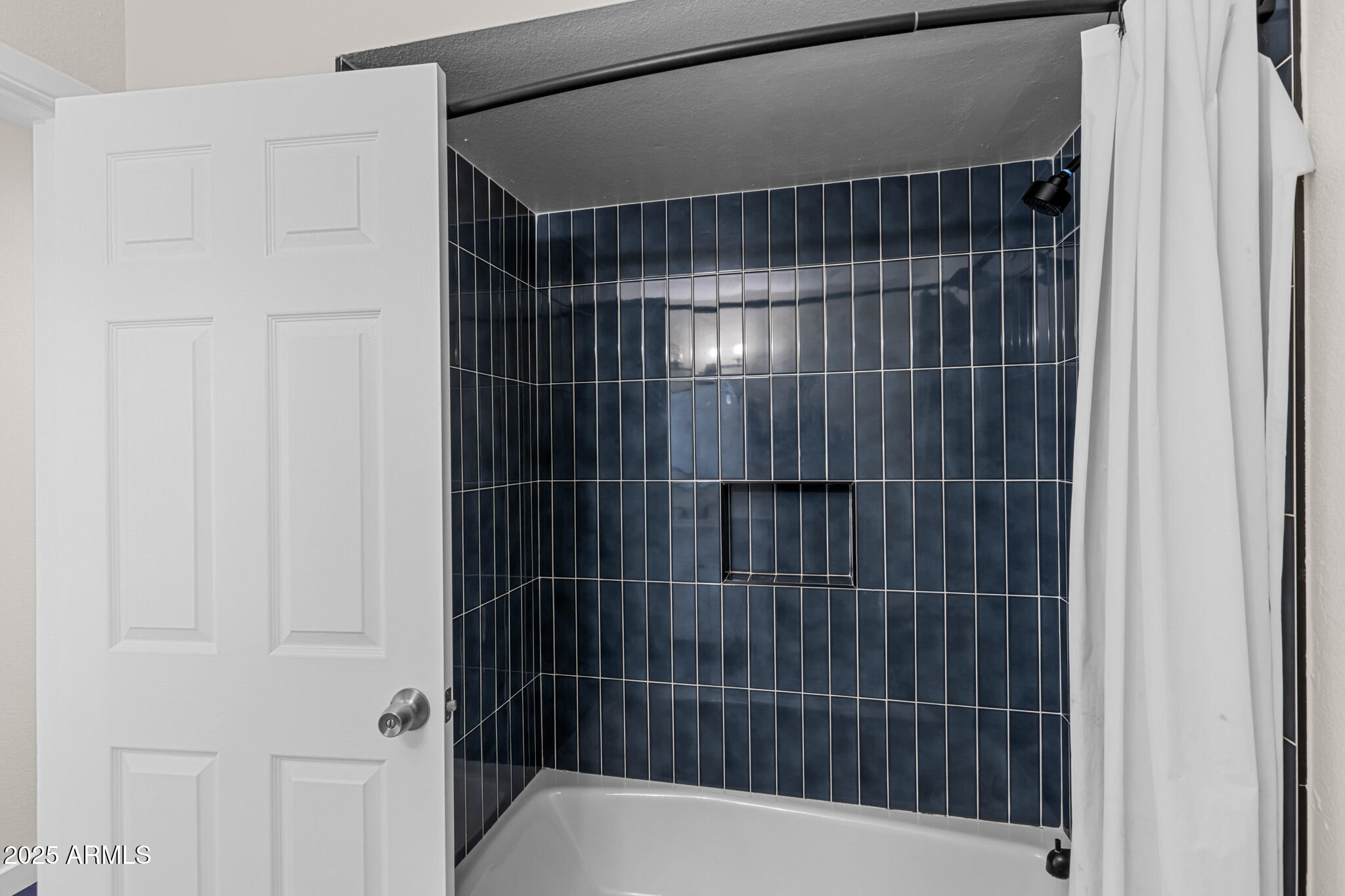 1911 East Lawrence Road Phoenix, AZ 85016 - Photo 29 of 49 a bathroom with a shower