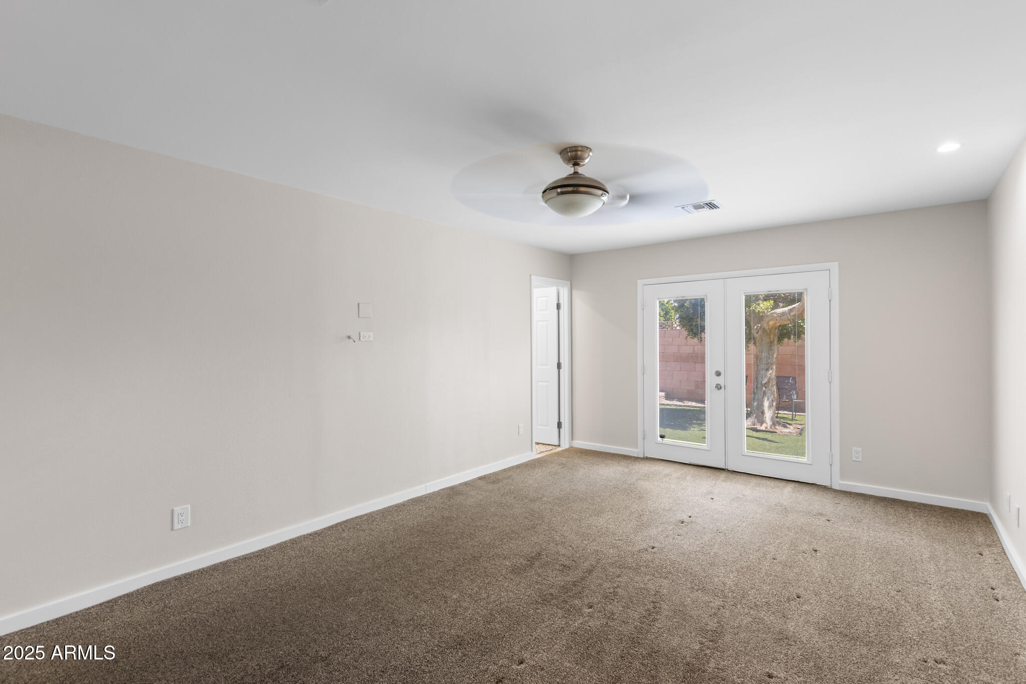 1911 East Lawrence Road Phoenix, AZ 85016 - Photo 36 of 49 a view of an empty room with a window