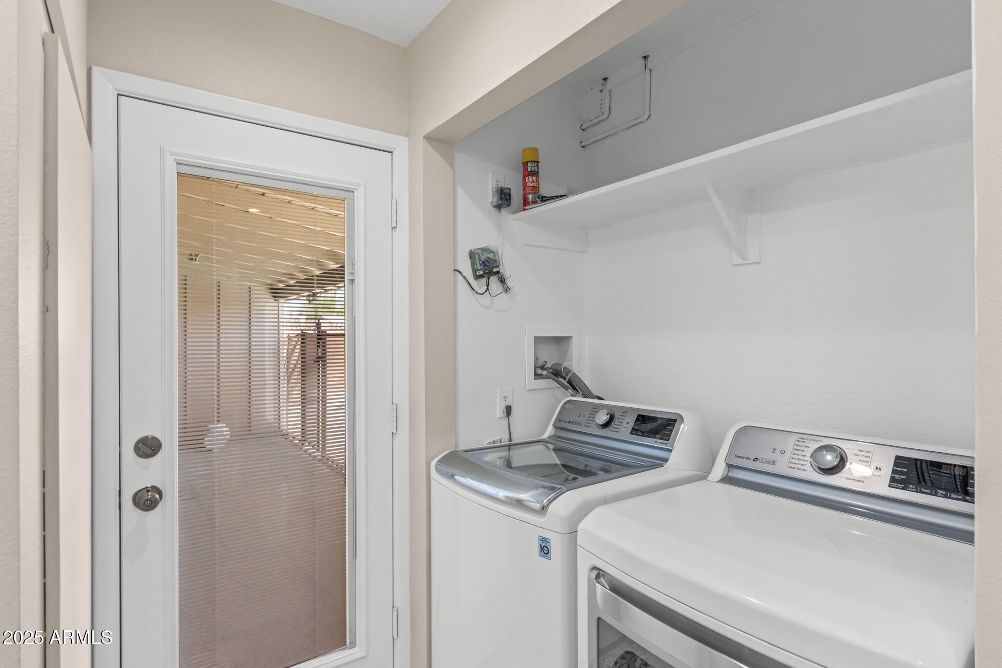 1911 East Lawrence Road Phoenix, AZ 85016 - Photo 41 of 49 a utility room with dryer and washer