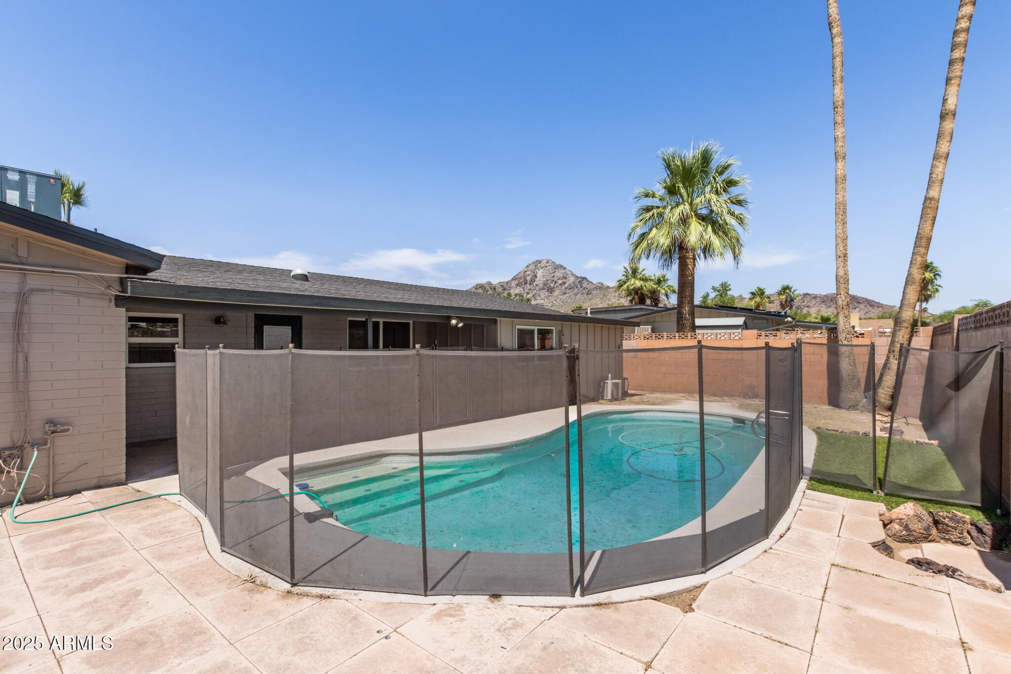 1911 East Lawrence Road Phoenix, AZ 85016 - Photo 49 of 49 a house view with a garden space