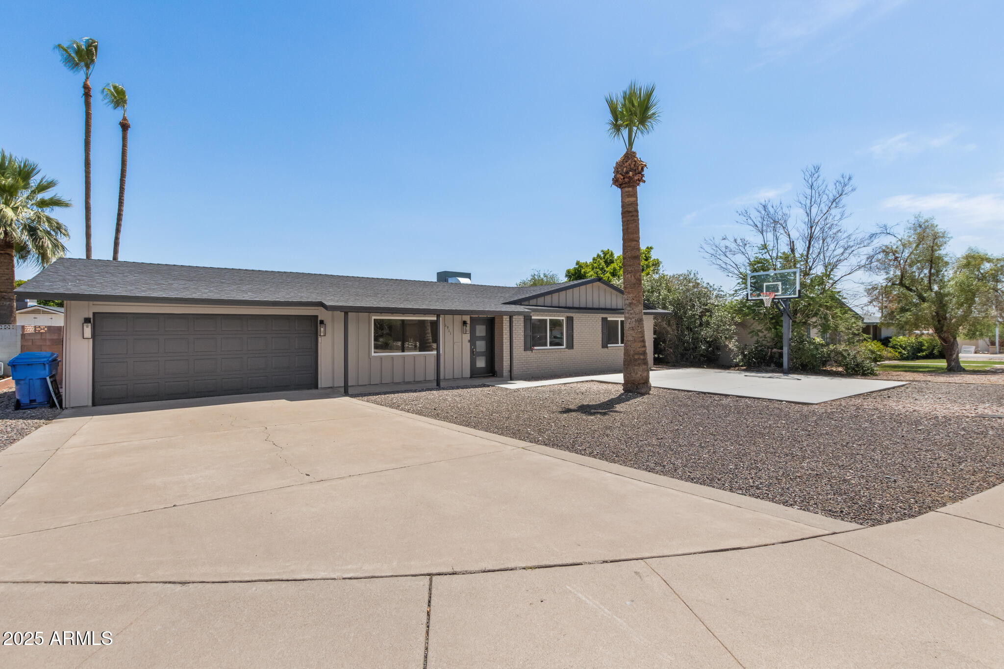 1911 East Lawrence Road Phoenix, AZ 85016 - Photo 7 of 49 a front view of a house with a yard