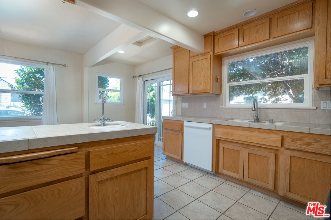 722 South McClelland Street Santa Maria, CA 93454 - Photo 11 of 27 a kitchen with a sink and cabinets