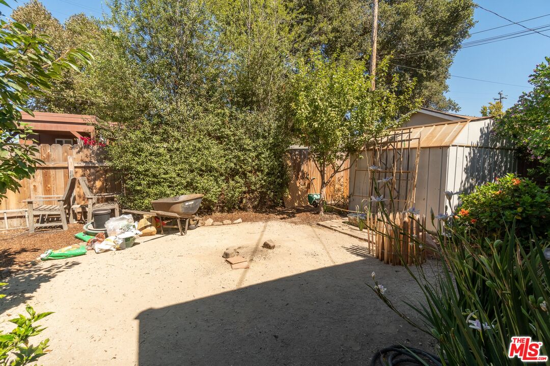 722 South McClelland Street Santa Maria, CA 93454 - Photo 22 of 27 a view of a backyard with a tree